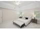 Spacious main bedroom featuring tray ceilings, a ceiling fan, and carpeted floors at 3104 Highgate Dr, Fort Mill, SC 29715