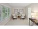Bright sitting area with neutral walls, carpeted floors, and a large window for natural light at 3104 Highgate Dr, Fort Mill, SC 29715