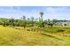 Expansive backyard with mature trees offering privacy and scenic views of the surrounding landscape at 329 Secretariat Dr, Iron Station, NC 28080