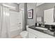 Bathroom featuring a shower-tub combo, granite countertop, and modern fixtures at 329 Secretariat Dr, Iron Station, NC 28080