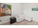 Comfortable bedroom featuring a sofa, modern decor, and neutral color scheme at 329 Secretariat Dr, Iron Station, NC 28080