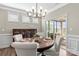 Cozy dining room with natural light and access to a sunroom at 329 Secretariat Dr, Iron Station, NC 28080