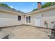 The home features a concrete patio, backyard access and neutral siding at 3712 Eaglebrook Dr, Gastonia, NC 28056