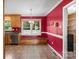 Inviting dining room featuring a built-in bench, large windows, and tiled flooring at 3712 Eaglebrook Dr, Gastonia, NC 28056