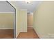 Hallway with neutral walls, trim, and flooring that create a blank canvas for personalizing your home's design at 3712 Eaglebrook Dr, Gastonia, NC 28056