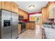 Efficient kitchen layout with modern appliances and direct view to a naturally lit adjacent room at 3712 Eaglebrook Dr, Gastonia, NC 28056