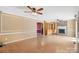 Open-concept living room with classic details, hardwood floors and a cozy atmosphere at 3712 Eaglebrook Dr, Gastonia, NC 28056