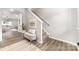 Inviting entryway with stylish bench seating and staircase access at 4009 Stoneygreen Ln, Charlotte, NC 28215