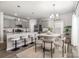Eat-in kitchen with granite counters, stainless appliances, and a cozy breakfast nook at 4009 Stoneygreen Ln, Charlotte, NC 28215