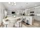 Open kitchen and dining area with modern light fixture at 4009 Stoneygreen Ln, Charlotte, NC 28215