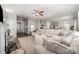 Open-concept living room with ample seating and seamless flow to kitchen at 4009 Stoneygreen Ln, Charlotte, NC 28215