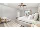 Serene main bedroom with neutral tones, large window, and plush carpeting at 4009 Stoneygreen Ln, Charlotte, NC 28215