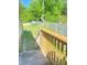 View of the wooden stairs from the back deck and serene backyard at 420 Baker Street Ext, Rock Hill, SC 29730