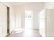 Bright kitchen space with white appliances and sliding glass doors to the backyard at 420 Baker Street Ext, Rock Hill, SC 29730