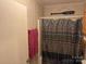 Full bathroom with a shower and tub combination with a themed shower curtain at 4225 Stewart Rd, Claremont, NC 28610