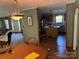 This home features a dining room with hardwood floors open to the living room and kitchen at 4225 Stewart Rd, Claremont, NC 28610