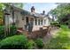 The brick patio is the perfect outdoor space for entertaining at 4234 Woodglen Ln, Charlotte, NC 28226