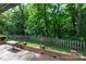 The home has a beautifully landscaped backyard with green space at 4234 Woodglen Ln, Charlotte, NC 28226