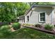 Charming home with lush landscaping and a beautiful backyard at 4234 Woodglen Ln, Charlotte, NC 28226