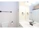 Bathroom featuring a white vanity, toilet and shower-tub at 4234 Woodglen Ln, Charlotte, NC 28226