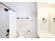 Bathroom featuring a white shower-tub combo, toilet and vanity at 4234 Woodglen Ln, Charlotte, NC 28226