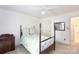 Bedroom with neutral carpet and a quaint wooden bed frame at 4234 Woodglen Ln, Charlotte, NC 28226