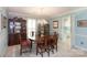 Elegant dining room features classic furniture, and a beautiful chandelier at 4234 Woodglen Ln, Charlotte, NC 28226