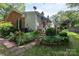 Beautiful home with lush landscaping and a peaceful outdoor space at 4234 Woodglen Ln, Charlotte, NC 28226