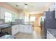 Well-lit kitchen with granite countertops, stainless steel appliances and an eat-in area at 4234 Woodglen Ln, Charlotte, NC 28226
