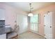 Cozy kitchen nook with bright lighting, a window, and charming decor, creating a welcoming space at 4234 Woodglen Ln, Charlotte, NC 28226