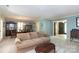 Spacious living room showcases an inviting atmosphere, an adjacent dining room, and classic design at 4234 Woodglen Ln, Charlotte, NC 28226