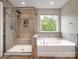 Bathroom with a walk-in shower, soaking tub, and a large window with natural light at 4316 Falls Lake Sw Dr, Concord, NC 28025