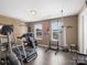 Stay fit in the exercise room equipped with treadmill, and other exercise equipment at 4316 Falls Lake Sw Dr, Concord, NC 28025