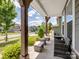 Charming front porch with comfortable seating and a view of the neighborhood at 4316 Falls Lake Sw Dr, Concord, NC 28025