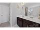 Bathroom features a double sink vanity, large mirror, and tiled floors at 5384 Gatsby Cir, Rock Hill, SC 29732