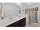 Bathroom featuring a double sink with a dark wood cabinet and tile flooring at 5384 Gatsby Cir, Rock Hill, SC 29732