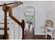 Bright hallway with hardwood floors leads to dining area and stairwell at 5384 Gatsby Cir, Rock Hill, SC 29732