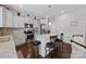 Bright kitchen boasts stainless steel appliances, granite counters, kitchen island with bar stool seating at 5384 Gatsby Cir, Rock Hill, SC 29732