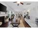 Spacious living room features a fireplace and an open concept view of the kitchen and dining areas at 5384 Gatsby Cir, Rock Hill, SC 29732