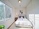 Cozy bedroom featuring a large window and neutral decor at 55 Ranlo Ave, Gastonia, NC 28054