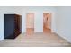 Bright kitchen featuring white cabinets, butcher block countertops, and stainless appliances at 55 Ranlo Ave, Gastonia, NC 28054