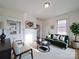 Bright living room showcasing a fireplace, stylish furniture, and natural light at 55 Ranlo Ave, Gastonia, NC 28054