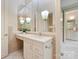 Bathroom showcasing tiled walls, vanity with sink, and a glimpse into the next room at 5701 Challisford Ln, Charlotte, NC 28226
