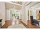 Elegant foyer featuring hardwood floors, detailed trim and an open floor plan at 5701 Challisford Ln, Charlotte, NC 28226