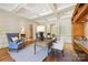 Cozy office with hardwood floors, coffered ceilings, and custom built-ins at 5701 Challisford Ln, Charlotte, NC 28226