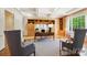 Well-appointed home office featuring custom built-ins and coffered ceilings at 5701 Challisford Ln, Charlotte, NC 28226