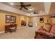 Finished basement featuring a lounge area with a sofa, chairs, and an ornate decorative lamp at 6164 Dwayne Starnes Dr, Hickory, NC 28602
