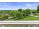 Scenic view of expansive lawn and mature trees, as seen from the home's porch at 6164 Dwayne Starnes Dr, Hickory, NC 28602
