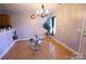 Inviting dining room showcasing natural light, perfect for gatherings and meals at 6614 Wicked Oak Ln, Charlotte, NC 28216