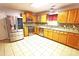 Bright kitchen features stainless steel appliances and granite countertops with a mosaic backsplash at 6614 Wicked Oak Ln, Charlotte, NC 28216